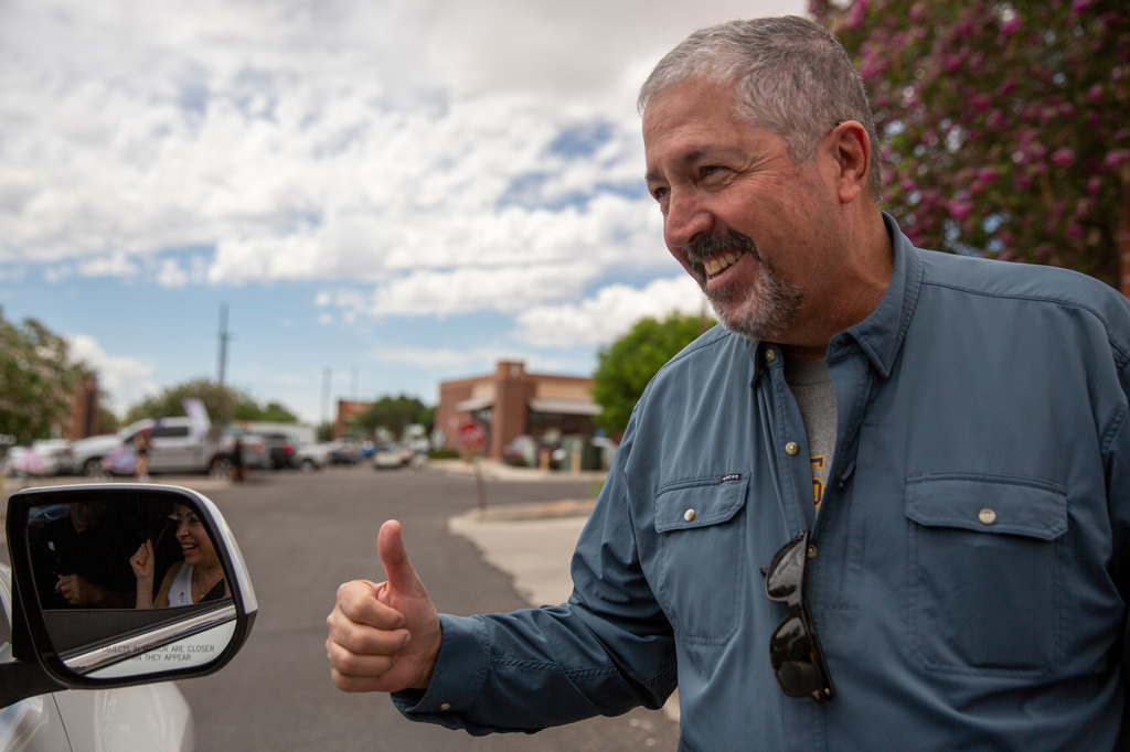 Sam Bregman talks with voters on primary Election Day, Tuesday, June 2, 2026, in Albuquerque, New Mexico. (AP Photo/Jon Austria)