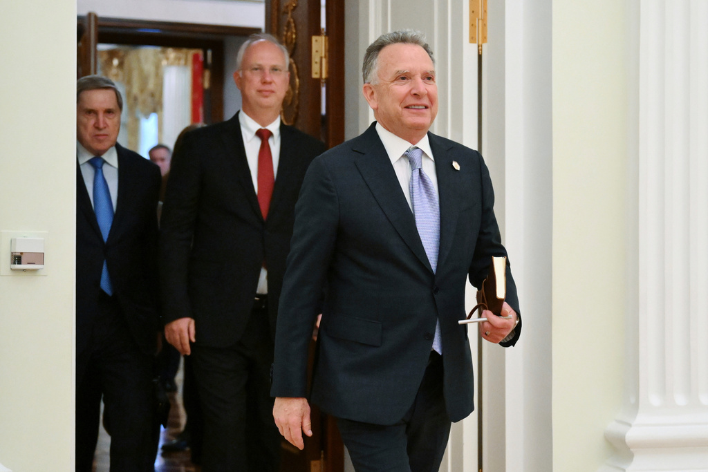 FILE - Starting from the right, U.S. President Donald Trump's special envoy Steve Witkoff, President Vladimir Putin's envoy Kirill Dmitriev, and Russian presidential aide Yuri Ushakov, attend talks with Putin at the Kremlin, in Moscow, on April 25, 2025. (Kristina Kormilitsyna, Sputnik, Kremlin Pool Photo via AP, File)
