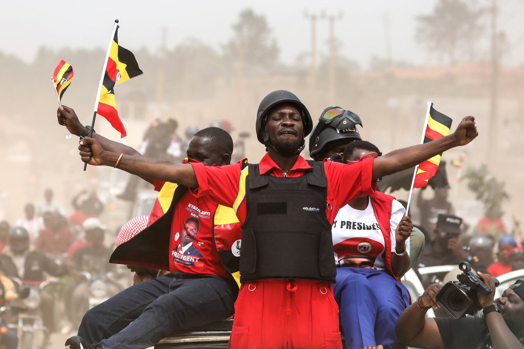 Uganda opposition presidential candidate Robert Kyagulanyi Ssentamu, who is known as Bobi Wine waves to supporters at an election campaign rally in Mukono, Uganda, Friday, Jan. 9, 2026. (AP Photo/Hajarah Nalwadda)