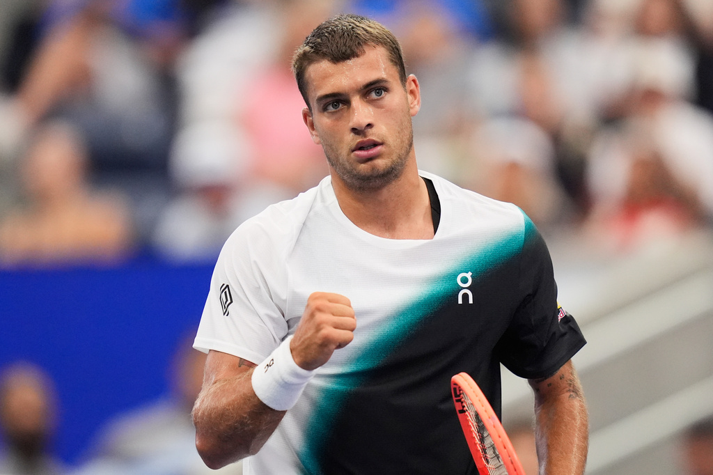 Flavio Cobolli, of Italy, reacts during a match against Francisco Comesana, of Argentina, during the first round of the U.S. Open tennis championships, Tuesday, Sept. 1, 2026, in New York. (AP Photo/Seth Wenig)