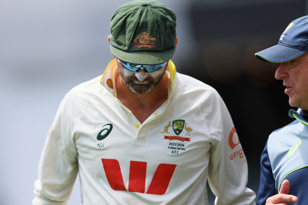 Australia's Nathan Lyon walks from the field during play on the final day of the third Ashes cricket test between England and Australia in Adelaide, Australia, Sunday, Dec. 21, 2025. (AP Photo/James Elsby)