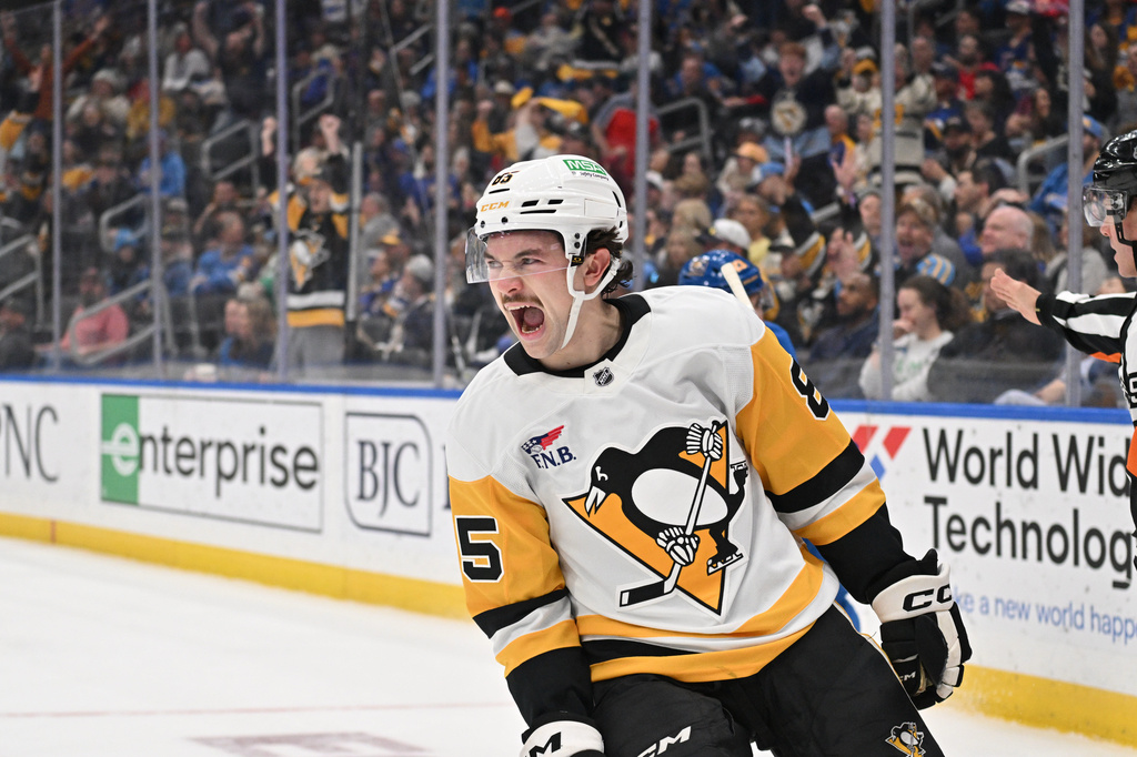 Pittsburgh Penguins right wing Avery Hayes reacts after scoring against the St. Louis Blues during the first period of an NHL hockey game Tuesday, April 14, 2026, in St. Louis. (AP Photo/Jeff Le)