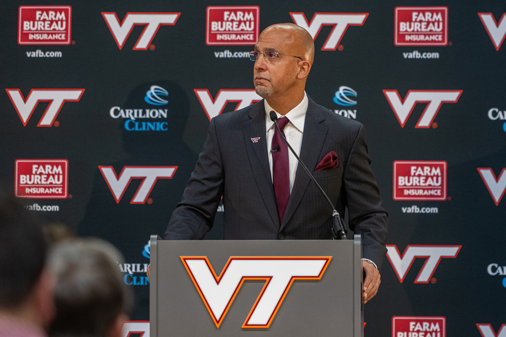 James Franklin, Virginia Tech's new head football coach, pauses after he was introduced during an NCAA college football news conference, Wednesday, Nov. 19, 2025, in Blacksburg, Va. (AP Photo/Robert Simmons)