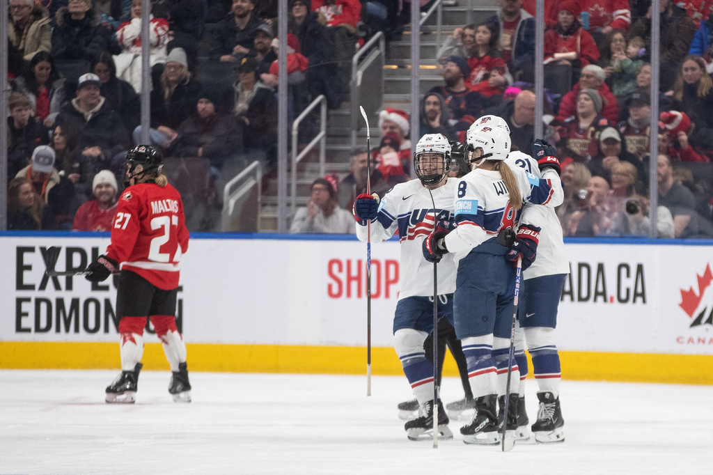 United States players celebrate a goal against Canada during the third period of a Rivalry Series hockey game in Edmonton, Alberta, Saturday, Dec. 13, 2025. (Jason Franson/The Canadian Press via AP)
