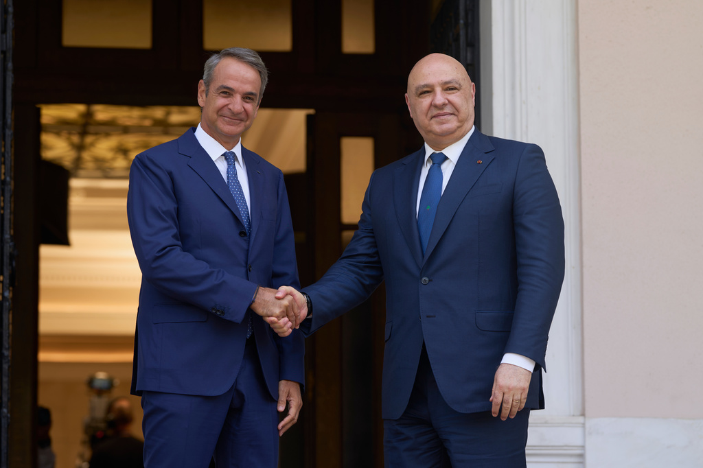Greek Prime Minister Kyriakos Mitsotakis, left, shakes hands with Lebanese President Joseph Aoun before their talk at the Maximos Mansion in Athens, Monday, Aug. 31, 2026. (AP Photo/Petros Giannakouris)