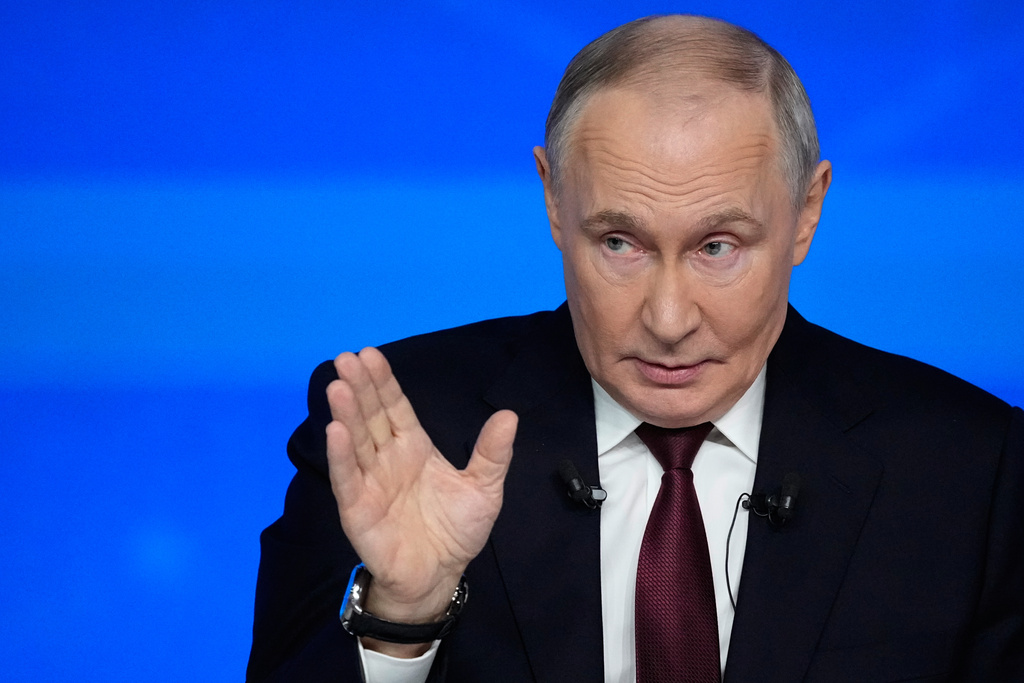 Russian President Vladimir Putin gestures while speaking during his annual news conference and call-in show at Gostinny Dvor, in Moscow, on Friday, Dec. 19, 2025. (AP Photo/Pavel Bednyakov)