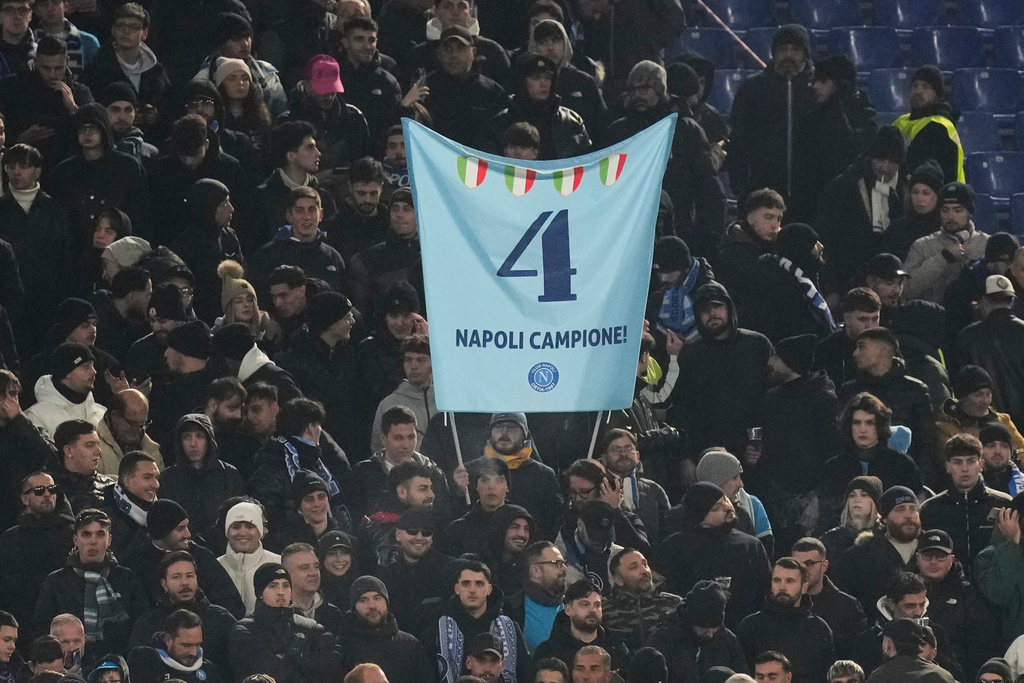 Napoli fans cheer prior to the start of the Serie A soccer match between Roma and Napoli, in Rome, Sunday, Nov. 30, 2025. (AP Photo/Gregorio Borgia)