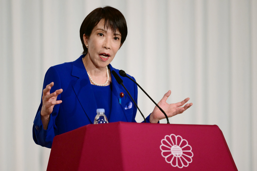 FILE - Sanae Takaichi, the newly-elected leader of Japan's ruling party, the Liberal Democratic Party (LDP), attends a press conference after the LDP presidential election in Tokyo Saturday, Oct. 4, 2025. (Yuichi Yamazaki/Pool Photo via AP, File)