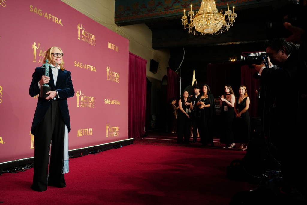 Amy Madigan poses in the press room with the award for outstanding performance by a female actor in a supporting role for "Weapons" during the 32nd Annual Actor Awards on Sunday, March 1, 2026, at the Shrine Auditorium and Expo Hall in Los Angeles. (Photo by Jordan Strauss/Invision/AP)