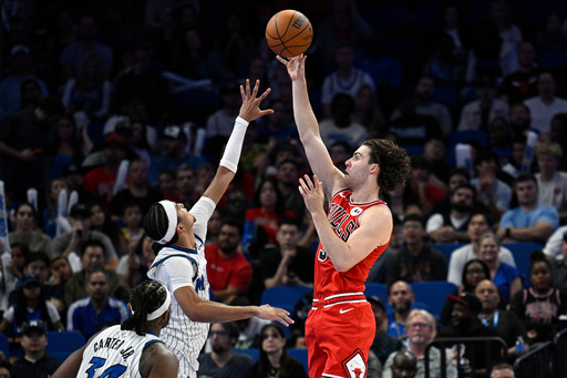 Chicago Bulls guard Josh Giddey, right, shoots in front of Orlando Magic guard Anthony Black and center Wendell Carter Jr. (34) during the second half of an NBA basketball game, Saturday, Oct. 25, 2025, in Orlando, Fla. (AP Photo/Phelan M. Ebenhack) Chicago Bulls guard Josh Giddey, right, shoots in front of Orlando Magic guard Anthony Black and center Wendell Carter Jr. (34) during the second half of an NBA basketball game, Saturday, Oct. 25, 2025, in Orlando, Fla. (AP Photo/Phelan M. Ebenhack)