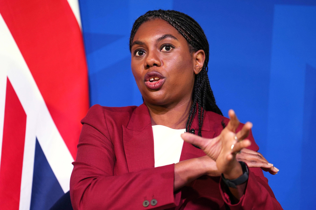 Britain's Conservative Party leader Kemi Badenoch gestures during an "in conversation" event with journalist Liam Halligan, in central London, Monday, Dec. 1, 2025. (Jordan Pettitt/PA via AP)