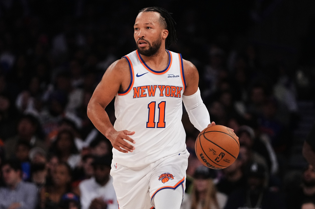 New York Knicks' Jalen Brunson (11) looks to pass during the second half of a preseason NBA basketball game against the Minnesota Timberwolves Monday, Oct. 12, 2026, in New York. (AP Photo/Frank Franklin II)