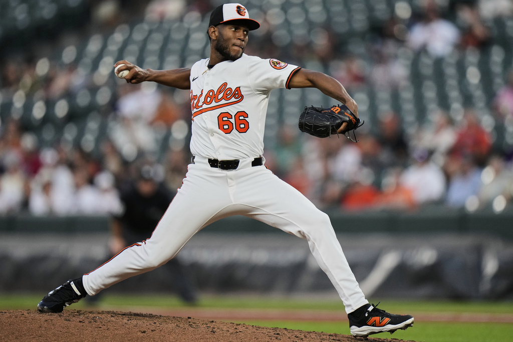 Baltimore Orioles relief pitcher Roansy Contreras (66) delivers during the fourth inning of a baseball game Boston Red Sox, Wednesday, Aug. 27, 2025, in Baltimore. (AP Photo/Stephanie Scarbrough)