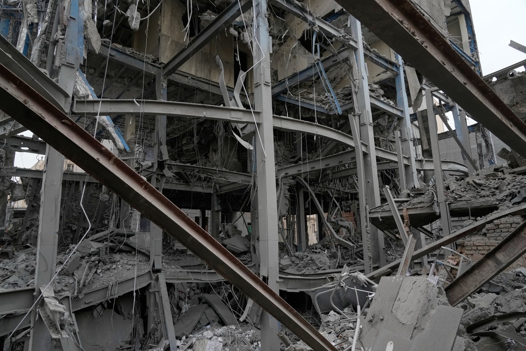 The shattered structure of a police station is seen after it was hit Friday in a U.S.-Israeli strike in Tehran, Iran, Sunday, March 15, 2026. (AP Photo/Vahid Salemi)