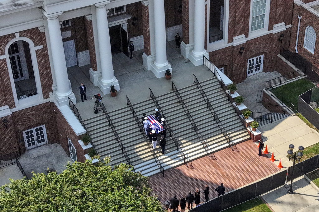 The casket of the late Sen. Lindsey Graham, R-S.C., is carried into First Baptist Church in Columbia, S.C., for a funeral service, Wednesday, July 29, 2026. (AP Photo/Gerald Herbert)