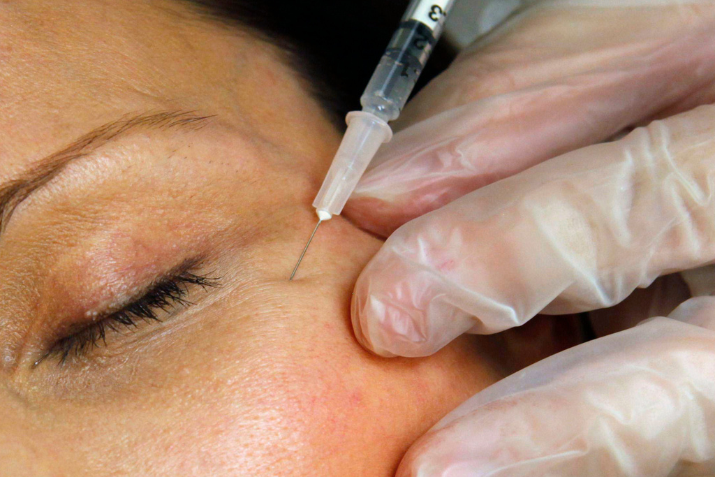 FILE - A patient receives a Botox injection at a clinic in Arlington, Va., on June 5, 2009. (AP Photo/Jacquelyn Martin, File)