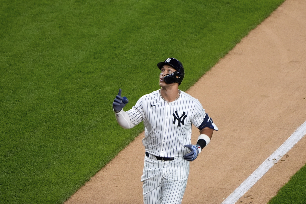 New York Yankees' Aaron Judge gestures after hitting a solo home run in the first inning of a baseball game against the Detroit Tigers Thursday, Sept. 11, 2025, in New York. (AP Photo/Alex Brandon)