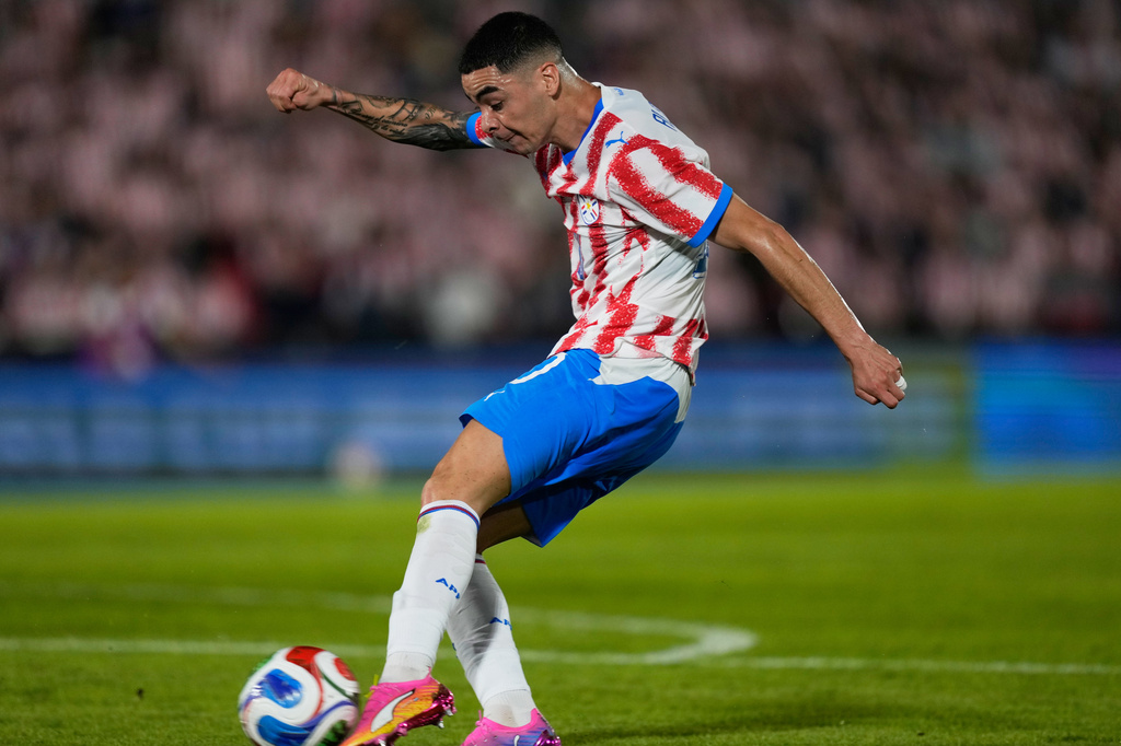 Paraguay's Miguel Almiron scores his side's second goal against Nicaragua during an international friendly soccer match in Asuncion, Paraguay, Friday, June 5, 2026. (AP Photo/Jorge Saenz)