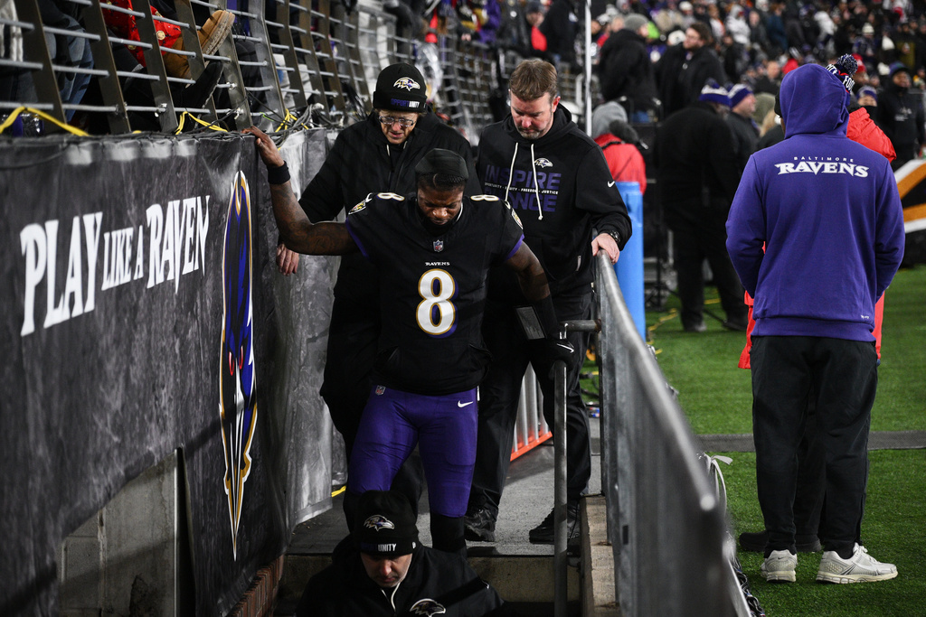 Baltimore Ravens quarterback Lamar Jackson (8) leaves the field during the first half of an NFL football game against the New England Patriots, Sunday, Dec. 21, 2025, in Baltimore. (AP Photo/Nick Wass)