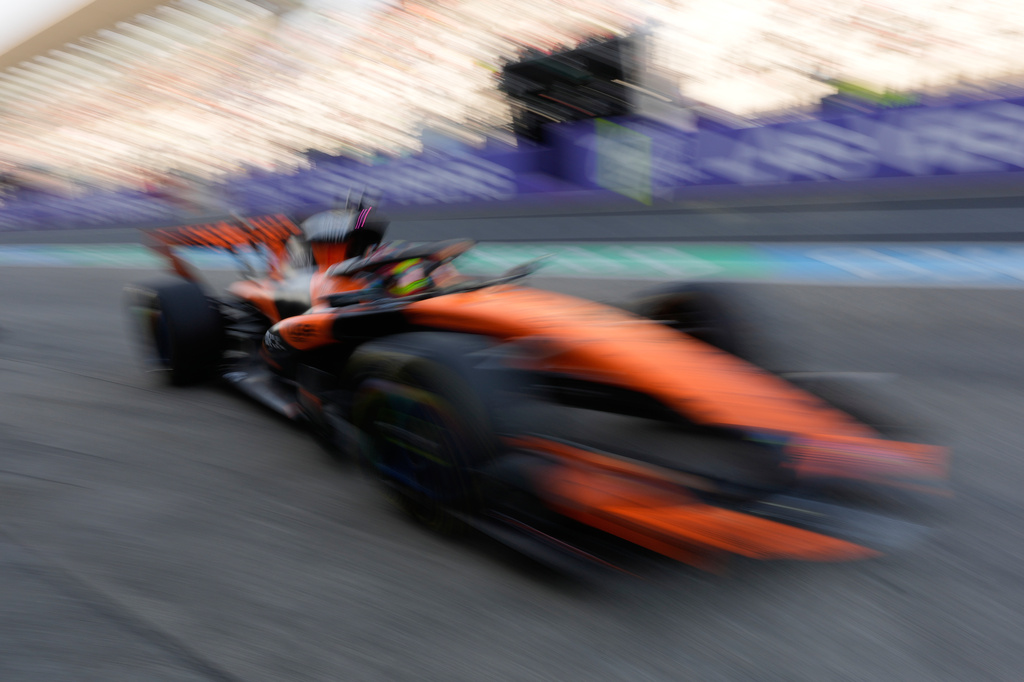McLaren driver Oscar Piastri of Australia steers his car into the pit during the second practice session Japanese Formula One Grand Prix in Suzuka, Japan, Friday, March 27, 2026. (AP Photo/Eugene Hoshiko)