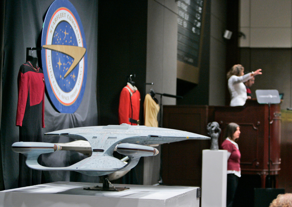FILE - Memorabilia is displayed at Christie's auction house in New York on Oct. 5, 2006, as a three-day sale of over 1,000 items from "Star Trek" went on on the block. (AP Photo/Jeff Christensen, File)