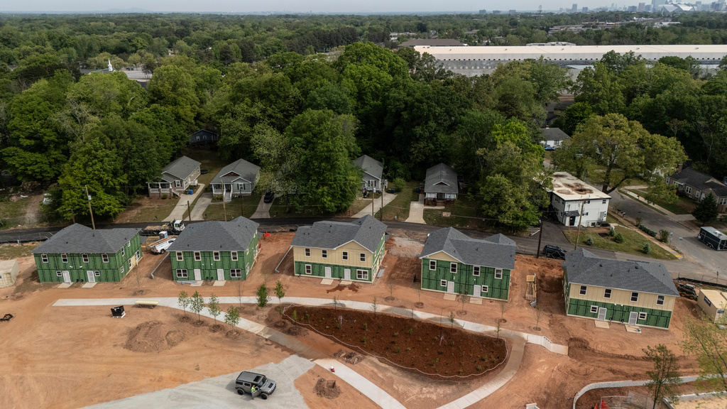 New homes under construction are seen in Langston Park, April 13, 2026, in Atlanta. (AP Photo/Mike Stewart)