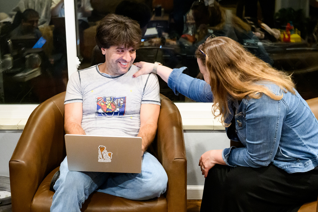Karl Deisseroth, one of the three recipients of the 2026 Nobel Prize in medicine, talks to his wife Michelle Monje-Deisseroth at home Monday, Oct. 5, 2026, in Stanford, Calif. (AP Photo/Noah Berger)
