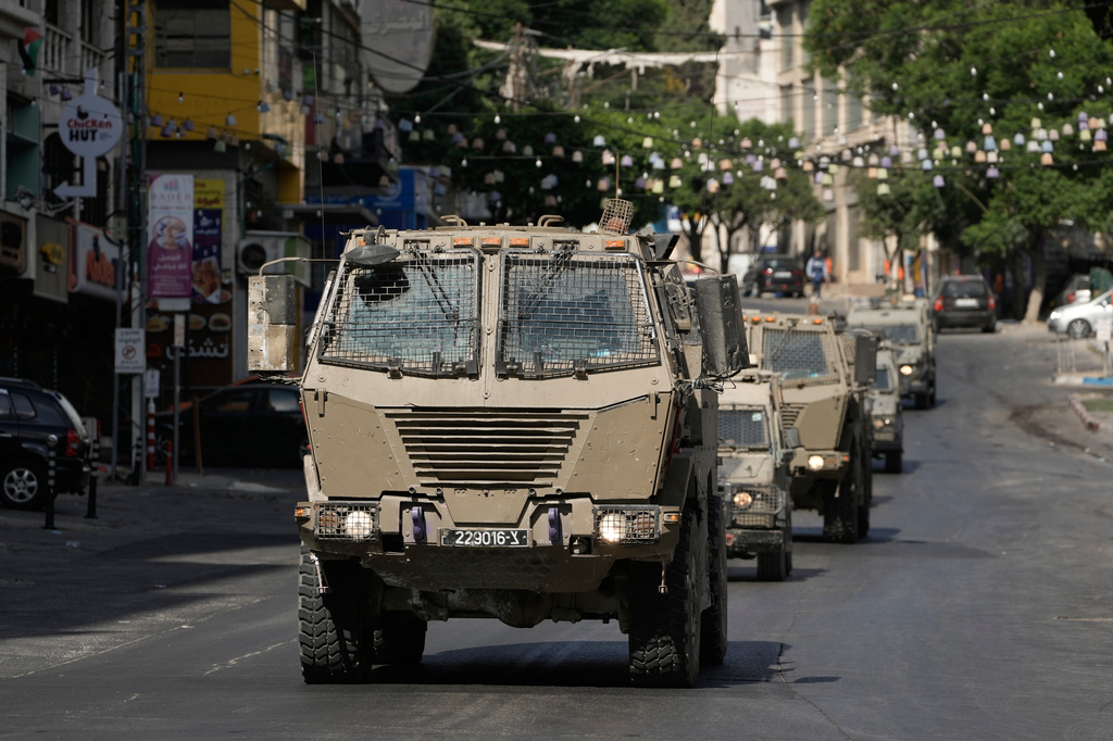 Israeli soldiers operate in the West Bank Palestinians city of Nablus, Sunday, July 26, 2026. (AP Photo/Majdi Mohammad)