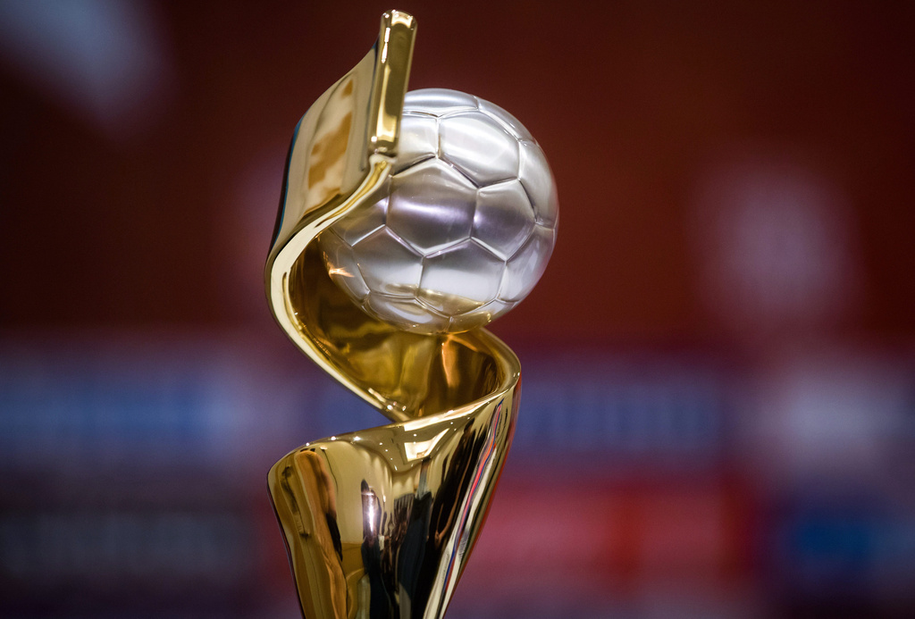 FILE - The FIFA Women's World Cup trophy is displayed during the opening press conference for the competition, Thursday June 4, 2015, in Vancouver, British Columbia. (Darryl Dyck/The Canadian Press via AP, File)