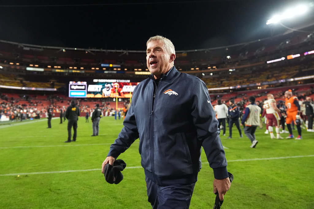 Denver Broncos head coach Sean Payton walks off the field after defeating the Washington Commanders in overtime of an NFL football game Monday, Dec. 1, 2025, in Landover, Md. (AP Photo/Stephanie Scarbrough)