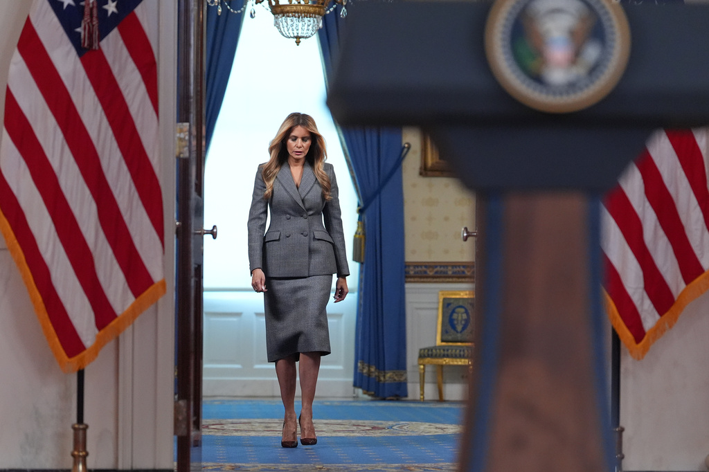First lady Melania Trump arrives to speak with reporters Thursday, April 9, 2026, in the Grand Foyer of the White House in Washington. (AP Photo/Jacquelyn Martin)