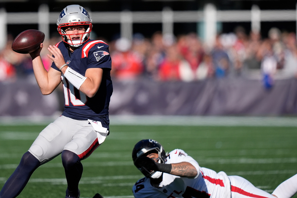 New England Patriots quarterback Drake Maye (10) passes against the Atlanta Falcons during the first half of an NFL football game, Sunday, Nov. 2, 2025, in Foxborough, Mass. (AP Photo/Robert F. Bukaty)