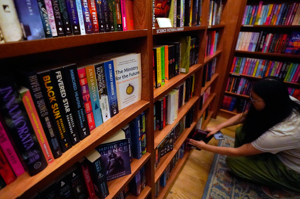 Kim Stanley Robinson's "The Ministry for the Future" sits on a shelf of a bookstore Monday, Sept. 14, 2026, in New York. (AP Photo/Alyssa Goodman)
