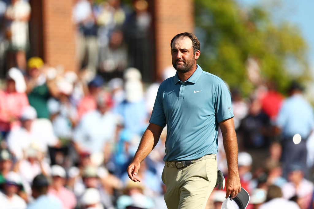 Scottie Scheffler walks off the 18th green during the final round of the PGA Tour Championship golf tournament Sunday, Aug. 30, 2026, in Atlanta. (AP Photo/Colin Hubbard)