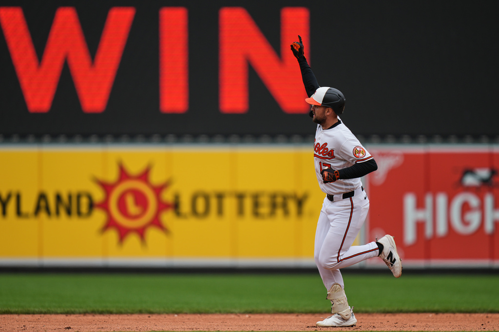 Baltimore Orioles' Colton Cowser rounds the bases after hitting a walkoff three-run home run during the ninth inning in the first baseball game of a doubleheader against the Detroit Tigers, Sunday, May 24, 2026, in Baltimore. (AP Photo/Stephanie Scarbrough)