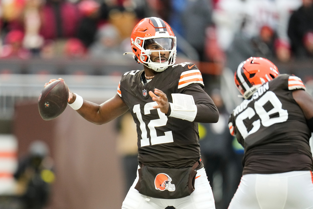 Cleveland Browns quarterback Shedeur Sanders (12) passes against the San Francisco 49ers during the second half of an NFL football game, Sunday, Nov. 30, 2025, in Cleveland. (AP Photo/Sue Ogrocki)