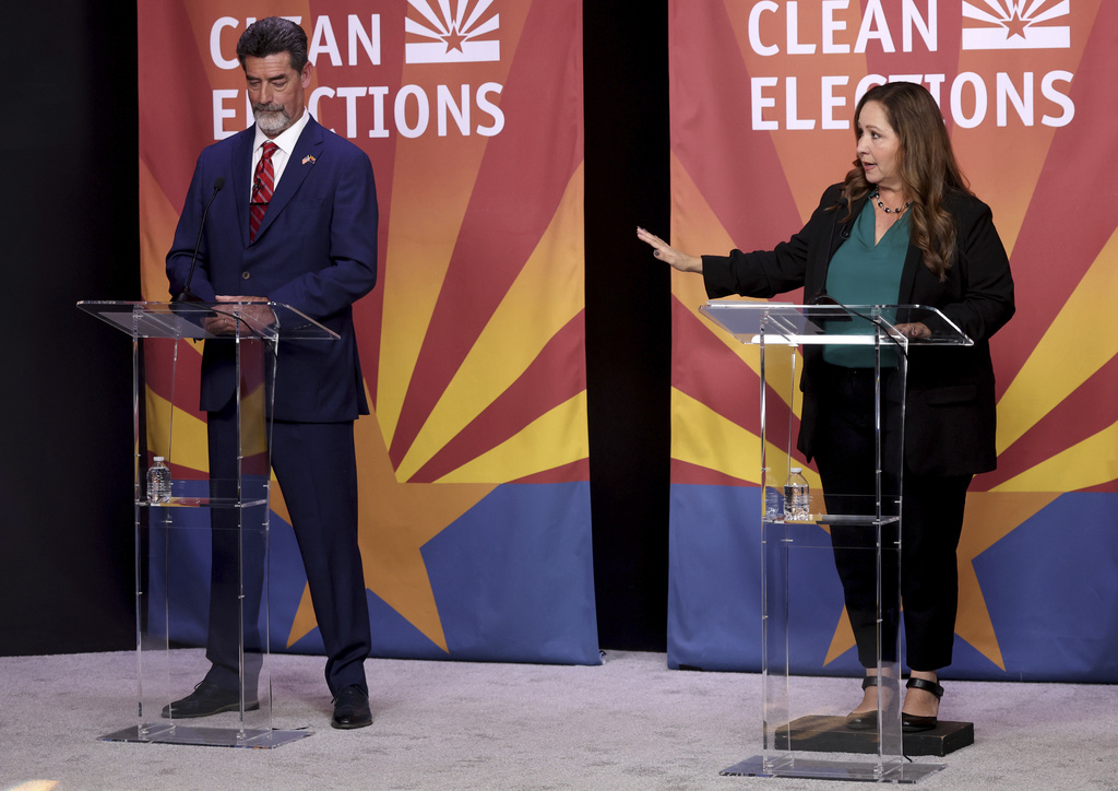 Congressional District 7 special election candidates Republican Daniel Butierez, left, and Democrat Adelita Grijalva participate during a televised debate, Tuesday, Aug. 26, 2025, in Tucson, Ariz. (Kelly Presnell/Arizona Daily Star via AP)