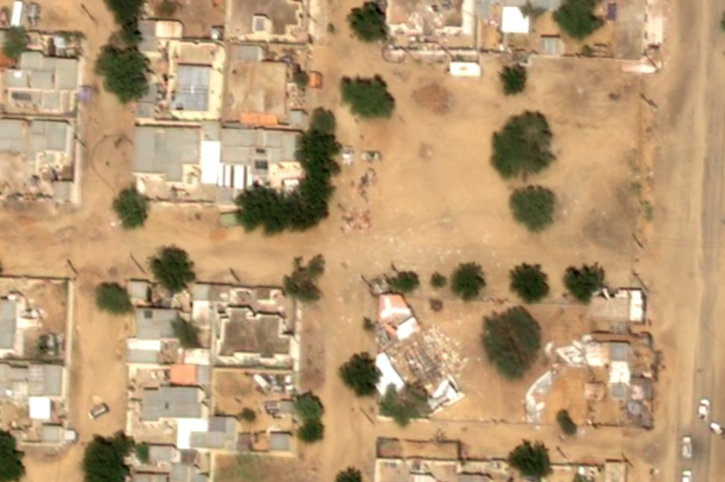 This satellite image taken by Airbus DS shows objects on the ground near what are likely Rapid Support Forces vehicles in the Daraja Oula neighborhood of el-Fasher, Sudan, Monday, Oct. 27, 2025. (Airbus DS 2025 via AP)