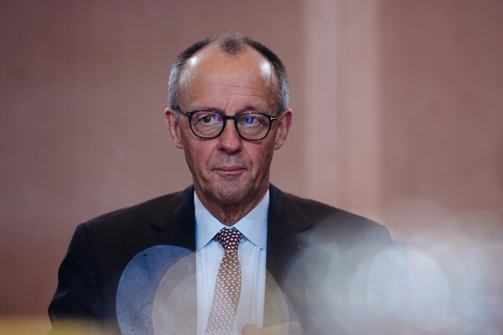 German Chancellor Friedrich Merz arrives for the cabinet meeting at the chancellery in Berlin, Germany, Wednesday, Dec. 3, 2025. (AP Photo/Markus Schreiber)