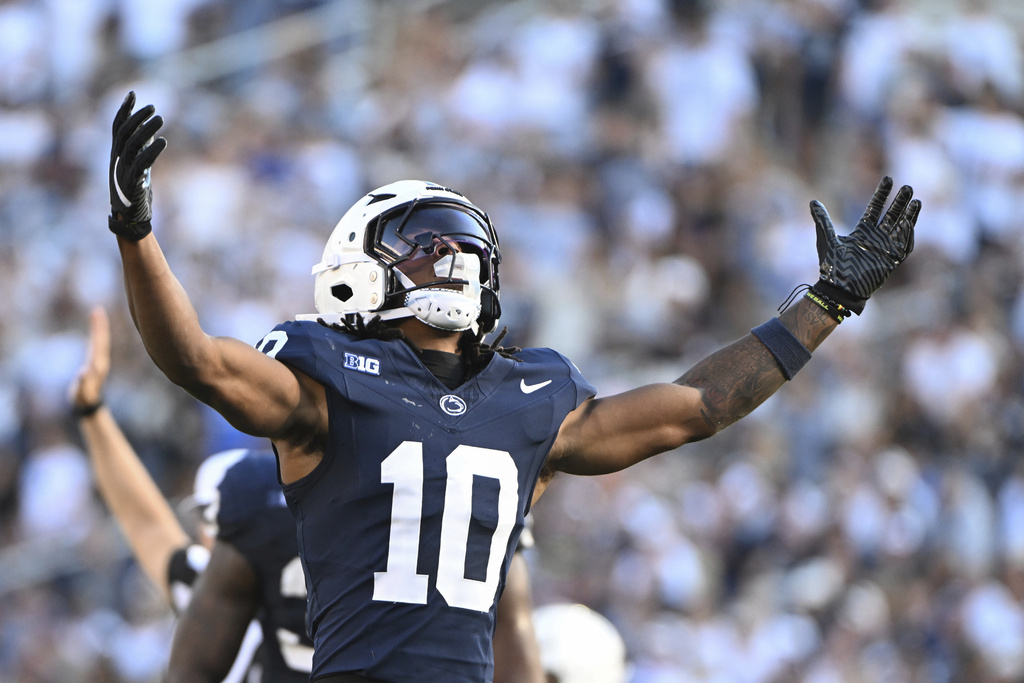 Penn State safety Dejuan Lane (10) celebrates after sacking Nevada quarterback Chubba Purdy (13) during the third quarter of an NCAA college football game, Saturday, Aug. 30, 2025, in State College, Pa. (AP Photo/Barry Reeger)