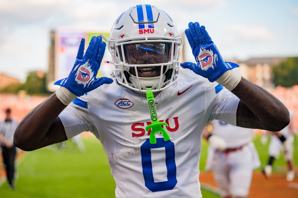 SMU running back Derrick McFall celebrates after his touchdown against Clemson in the second half of an NCAA college football game Saturday, Oct. 18, 2025, in Clemson, S.C. (AP Photo/Jacob Kupferman)