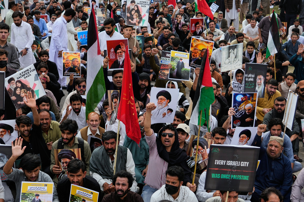 Shiite Muslims take part in a rally to condemn the killing of Iranian Supreme Leader Ayatollah Ali Khamenei and against the Israeli strikes on Iran, in Islamabad, Pakistan, Friday, March 6, 2026. (AP Photo/Anjum Naveed)