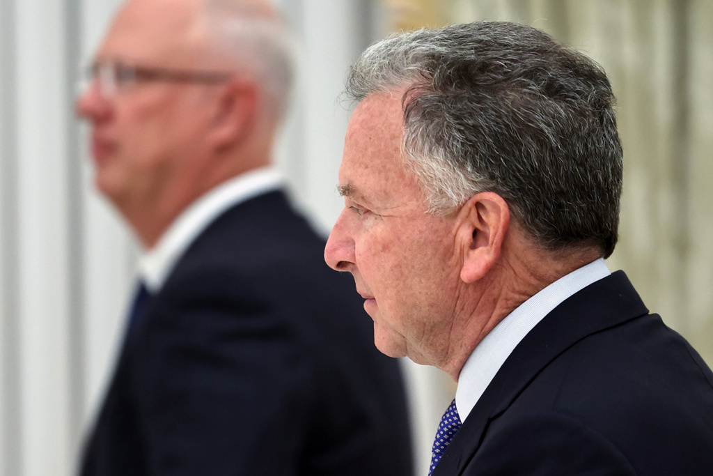 U.S. President Donald Trump's envoys Steve Witkoff, right, and Putin's envoy Kirill Dmitriev arrive to attend the talks with Russian President Vladimir Putin at the Senate Palace of the Kremlin, in Moscow, Thursday, Jan. 22, 2026. (Alexander Kazakov/Sputnik, Kremlin Pool Photo via AP)