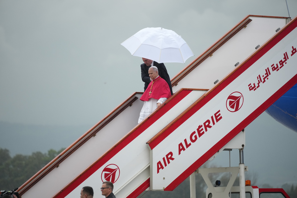 Pope Leo XIV arrives at Algiers' Houari Boumédiène International Airport on Monday, April 13, 2026, at the start of an 11-day apostolic journey to Africa. (AP Photo/Andrew Medichini)