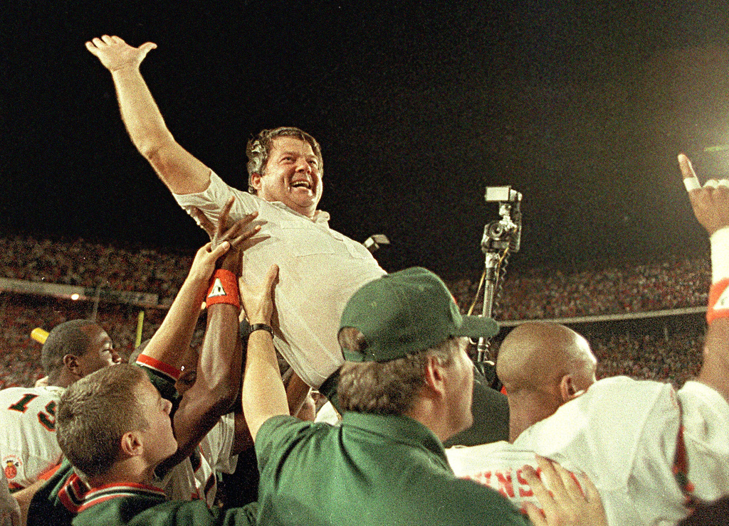FILE - In this Jan. 1, 1988, file photo, University of Miami coach Jimmy Johnson is carried from the field by his players after the Hurricanes defeated the Oklahoma 20-14 in the Orange Bowl Classic, in Miami. (AP Photo/Raul Demolina, File)