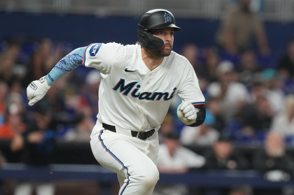 Miami Marlins' Joe Mack runs after hitting a double in the ninth inning of a baseball game against the Baltimore Orioles Thursday, May 7, 2026, in Miami. (AP Photo/Marta Lavandier)