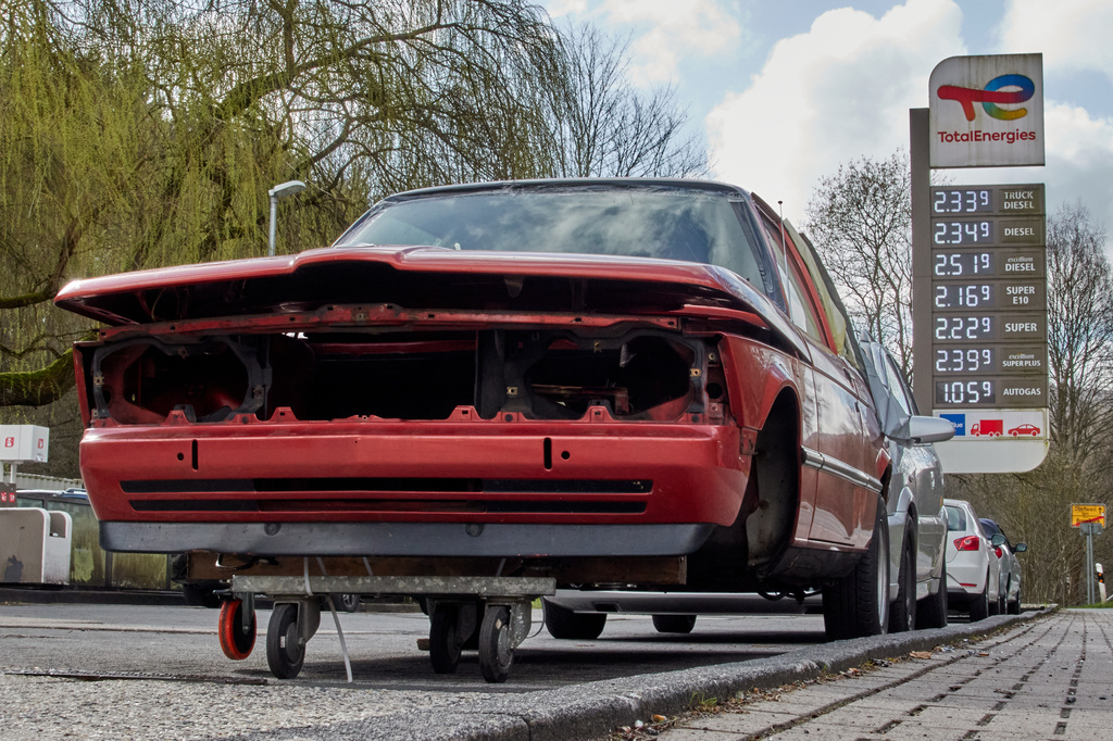 A wrecked gar stands at a gas station in Brombach near Frankfurt, Germany, Tuesday, March 31, 2026. (AP Photo/Michael Probst)