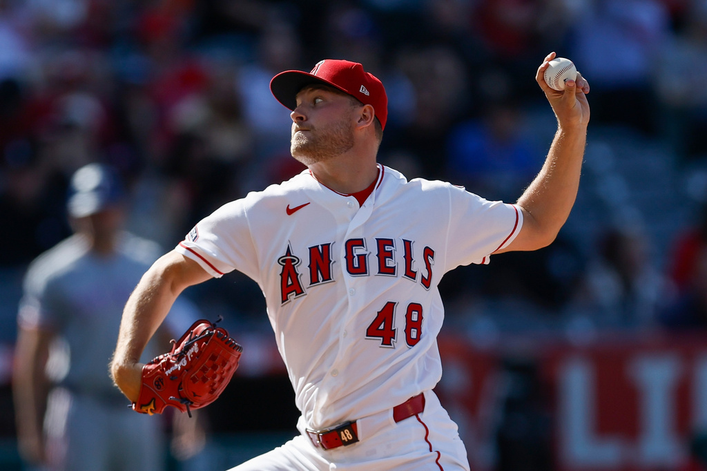 Los Angeles Angels starting pitcher Reid Detmers pitches during the first inning of a baseball game against the Texas Rangers, Sunday, May 24, 2026, in Anaheim, Calif. (AP Photo/Caroline Brehman)