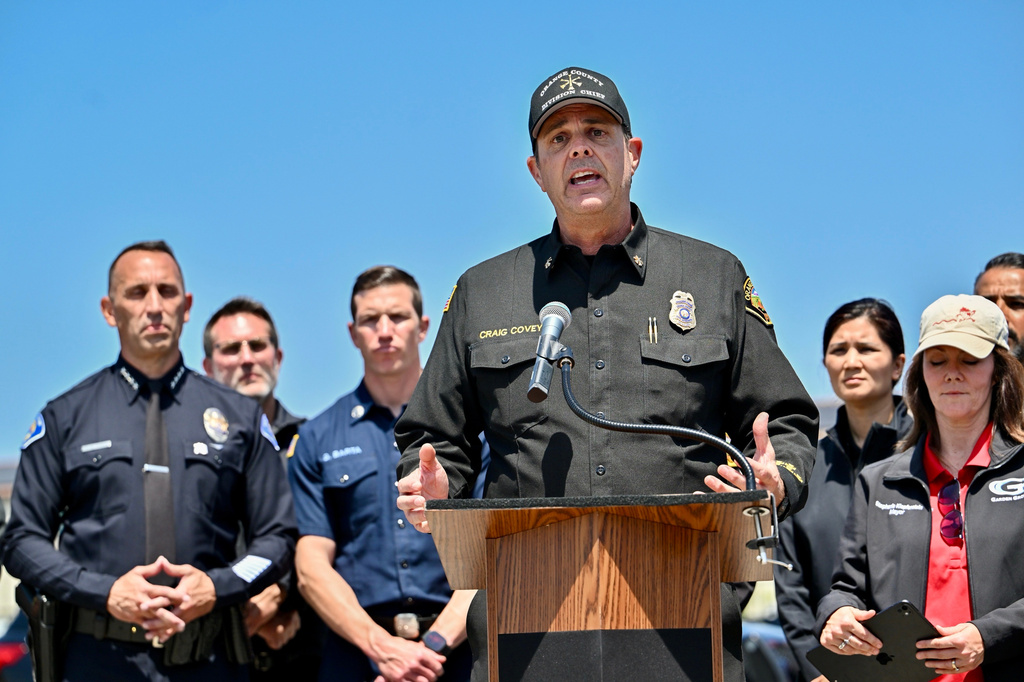 Orange County Fire Authority Division Chief Craig Covey speaks during a news conference at the Los Alamitos racetrack in Cypress, Calif., Friday, May 22, 2026, about hazmat situation in Garden Grove, Calif. (Jeff Gritchen/The Orange County Register via AP)