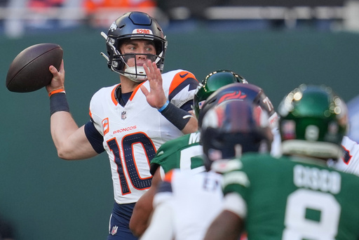 Denver Broncos quarterback Bo Nix passes the ball in the first half of an NFL football game between the Denver Broncos and the New York Jets, Sunday, Oct. 12, 2025, in London. (AP Photo/Kin Cheung) Denver Broncos quarterback Bo Nix passes the ball in the first half of an NFL football game between the Denver Broncos and the New York Jets, Sunday, Oct. 12, 2025, in London. (AP Photo/Kin Cheung)